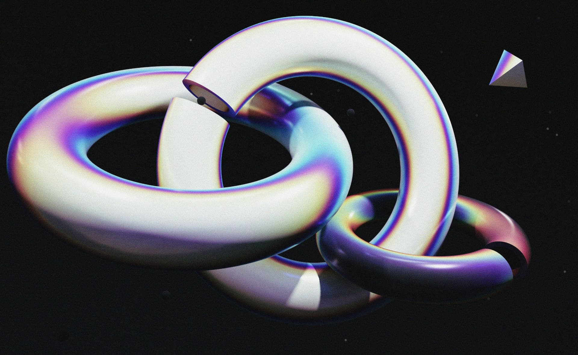 Three glossy iridescent rings interlocking against a dark field, symbolizing connected systems