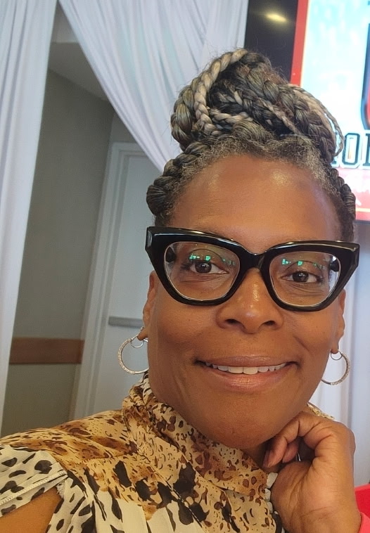 Portrait of Dr. Krystal Alexander, Lead Administrative Executive of Purposeful Presenters
